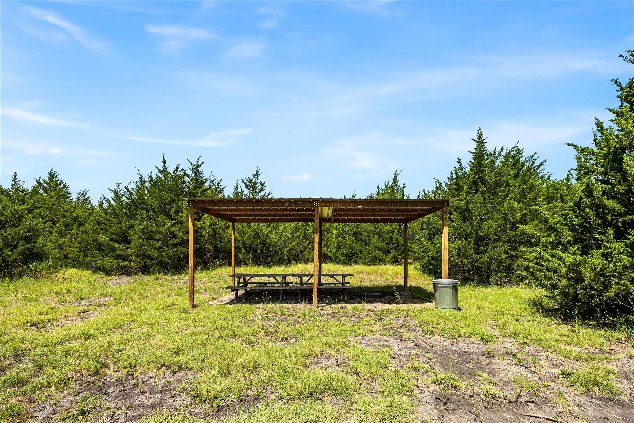 Covered pavilion with 2 picnic tables.