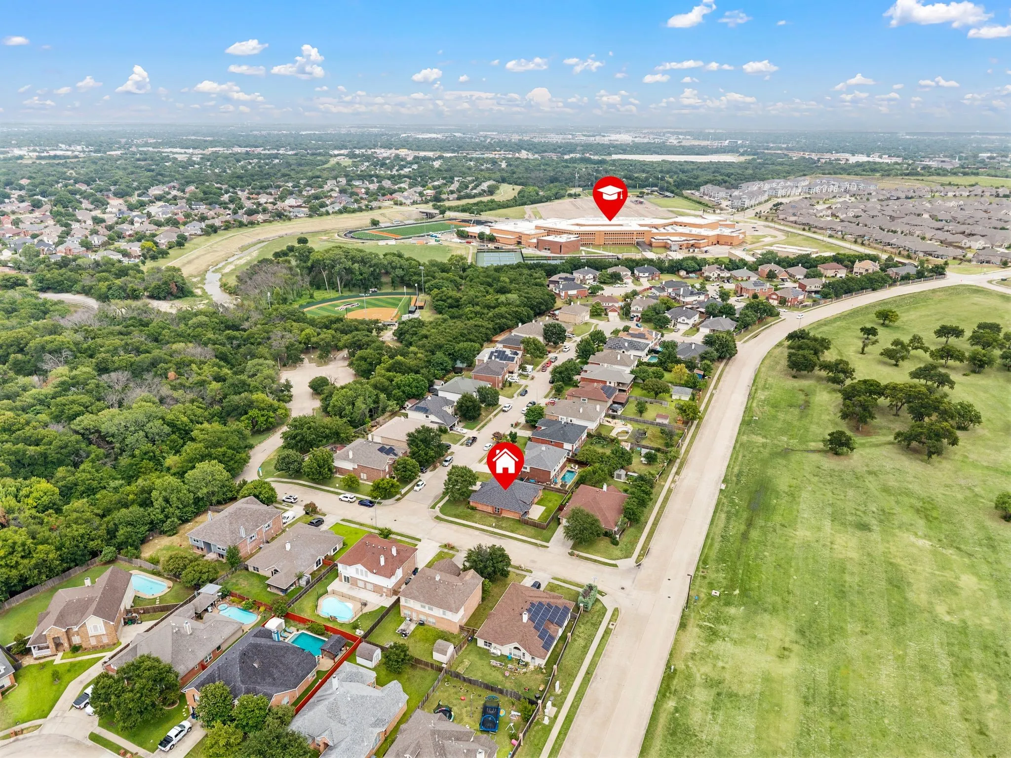 Aerial view of a residential neighborhood with varied architectural styles