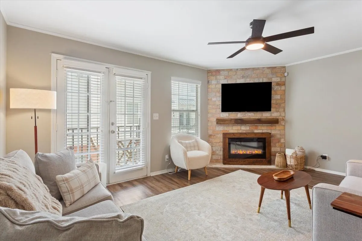 French doors open to the covered patio, creating an ideal indoor-outdoor living space.