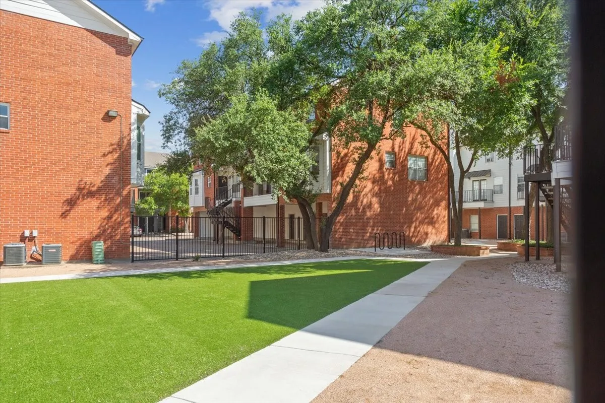 A rare campus-area amenity—this private gated courtyard offers a peaceful place to relax just steps from Baylor University.