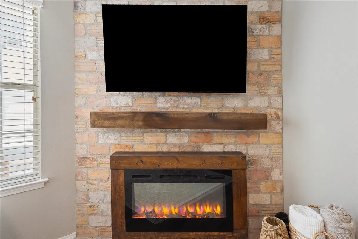 Decorative accent wall with an electric fireplace creates a warm and inviting focal point in the living room.