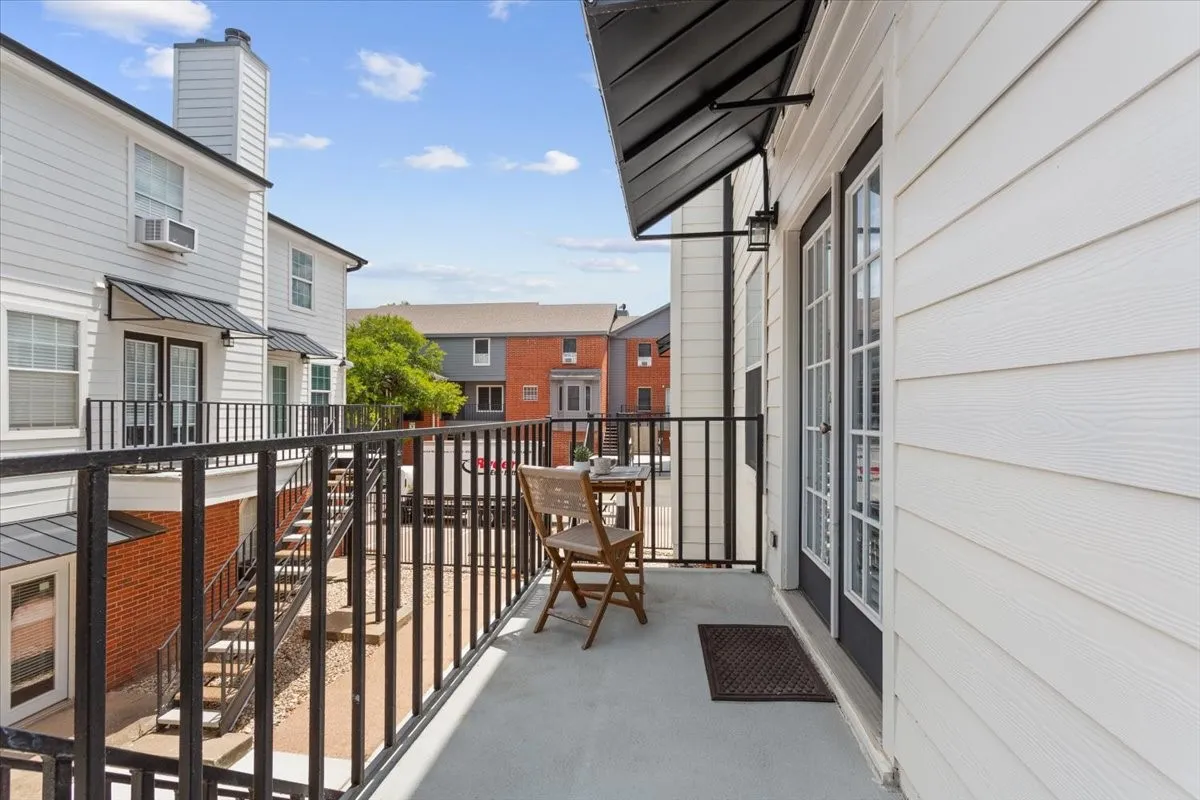 Second view showcasing the covered patio's connection to the home's main living areas.