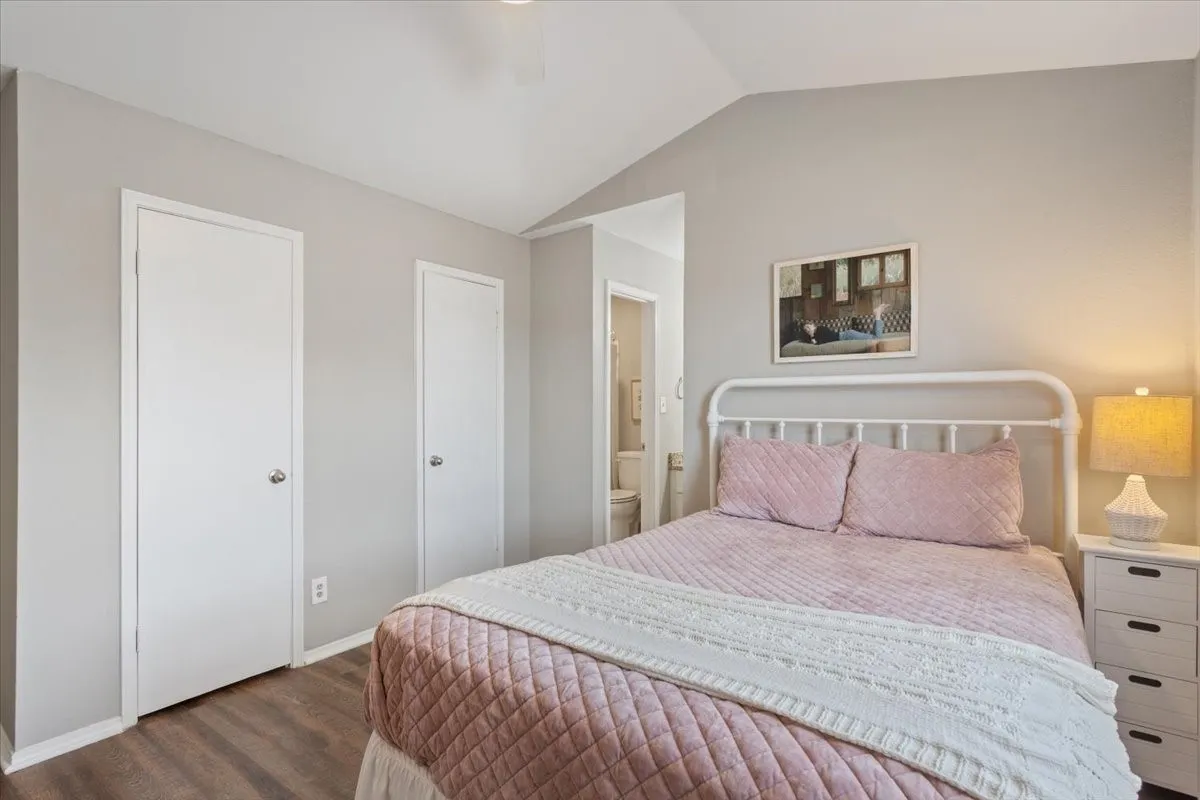 Primary bedroom offers excellent storage with two walk-in closets and a comfortable layout for everyday living.