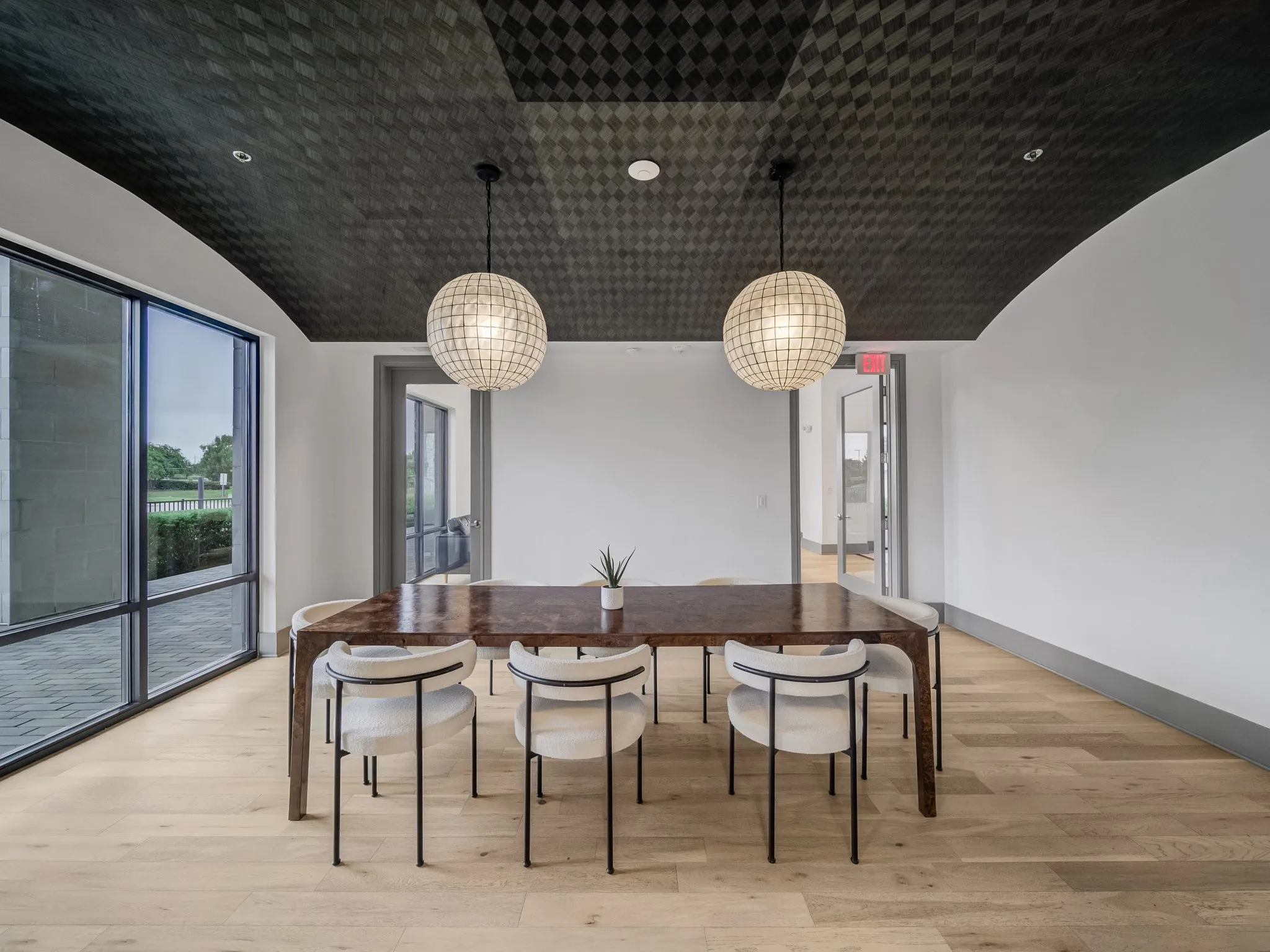 Vaulted ceiling with geometric dark-toned detailing