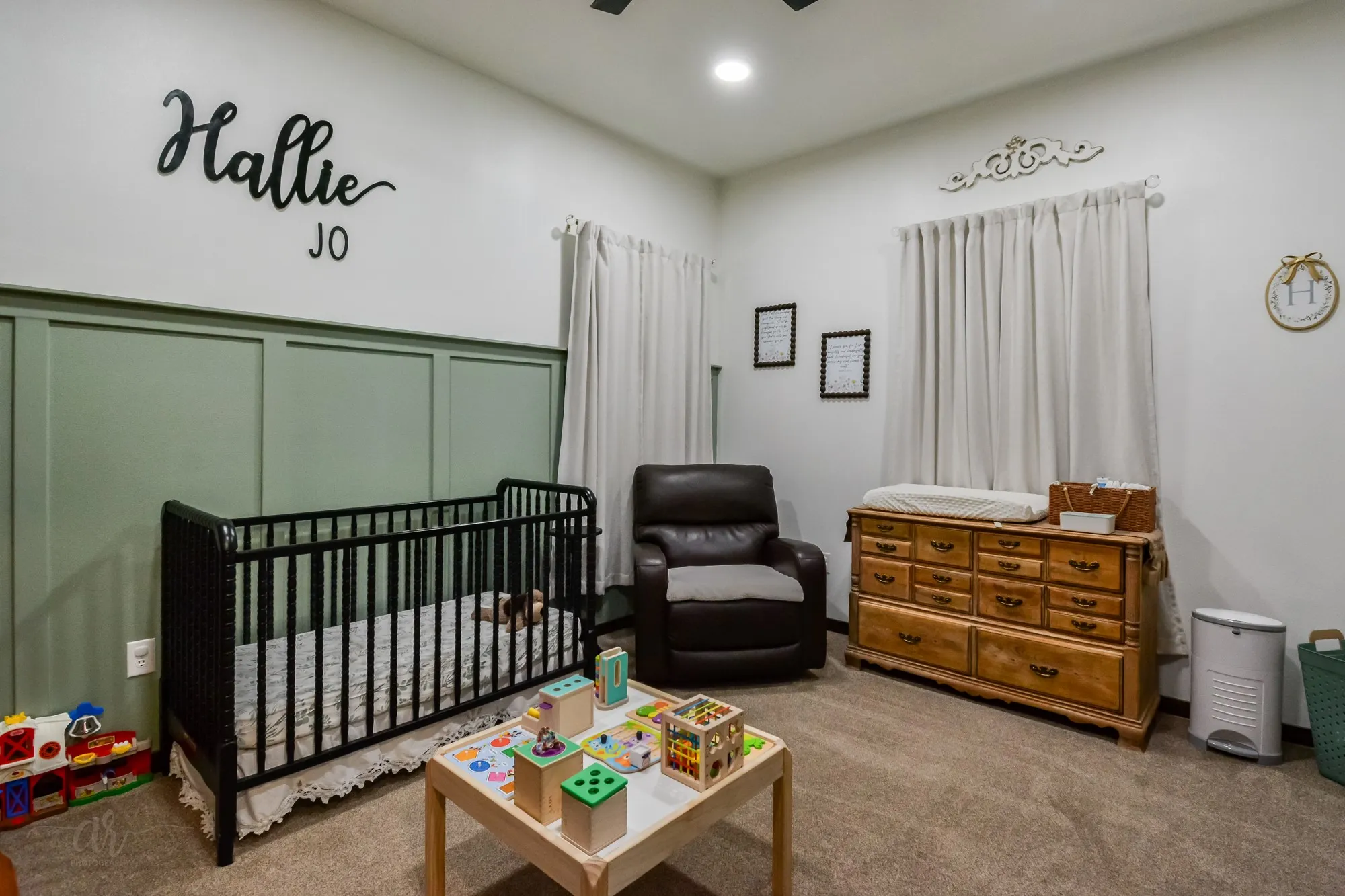 Room featuring wall paneling, recessed lighting, and carpeted flooring