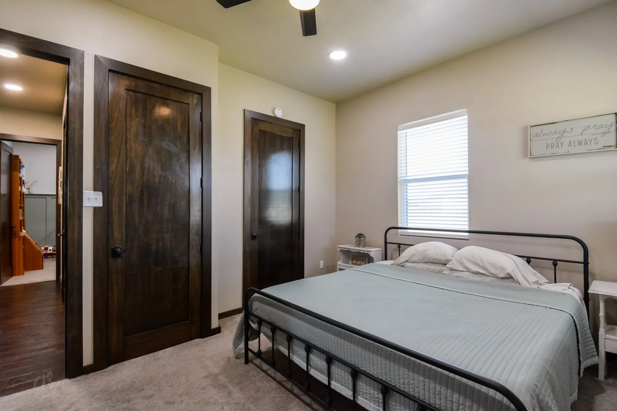 Bedroom featuring a window with blinds, carpet flooring, a ceiling fan, and recessed lighting