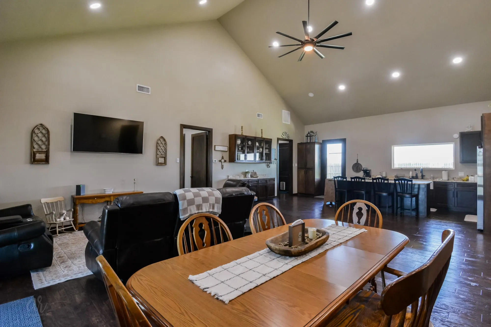 Open-concept living space with vaulted ceilings