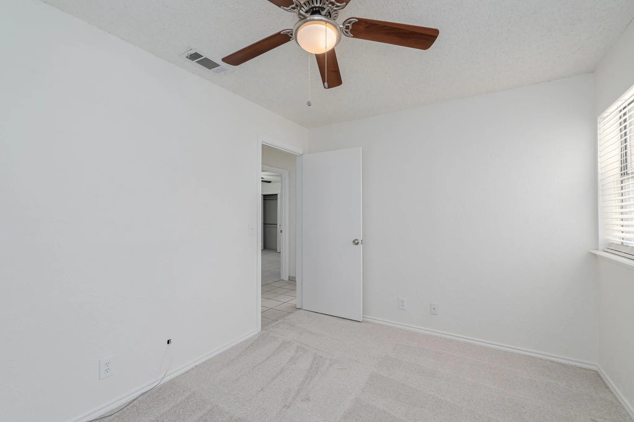 Another view of the secondary bedroom. All the bedrooms are spacious!