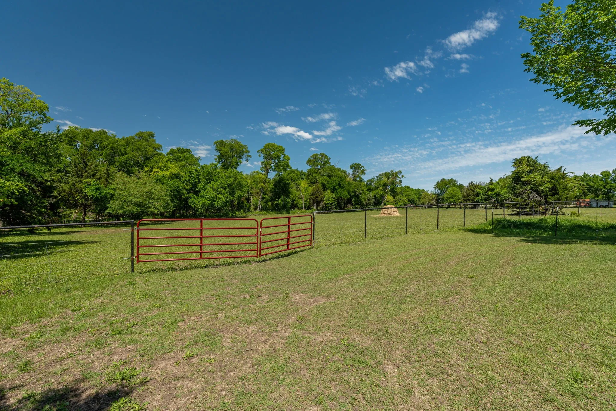 Wide-open green space offers room to garden, play, or simply enjoy the tranquility of country living.