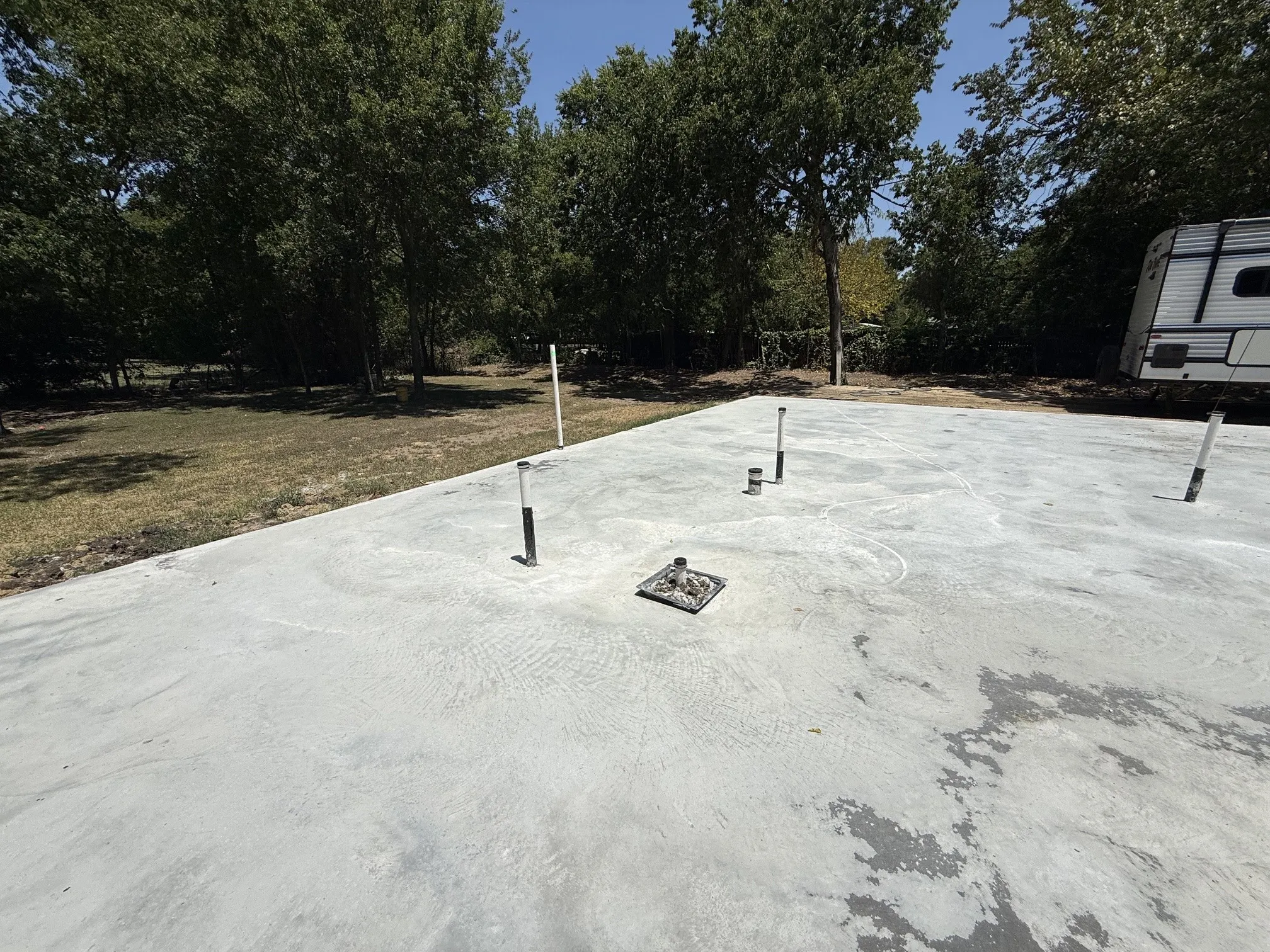 Concrete slab foundation with integrated plumbing rough-ins