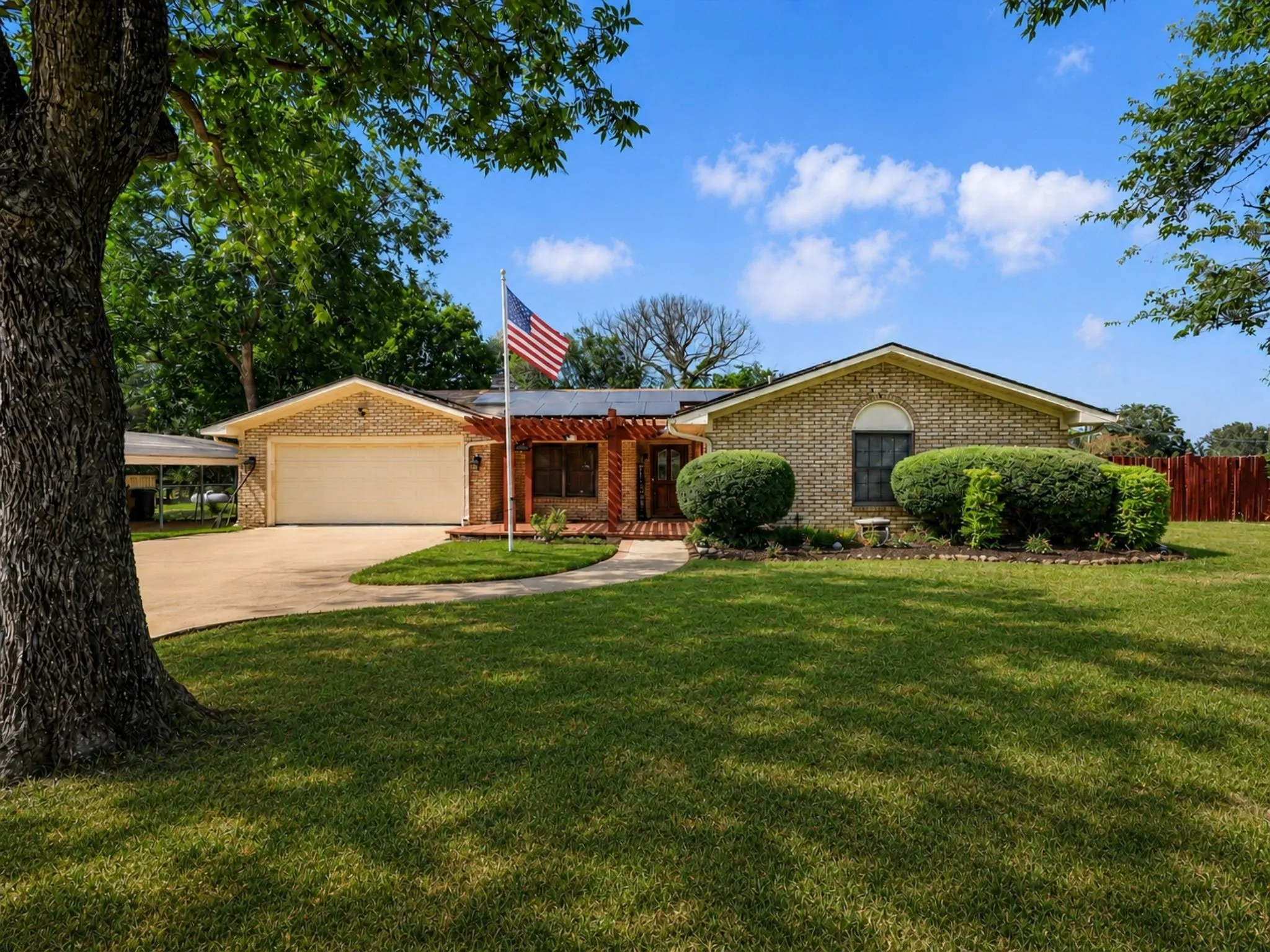 Welcome home! Nestled on nearly half an acre beneath mature shade trees, this charming property offers timeless curb appeal and fully paid-off solar panels for years of energy savings.