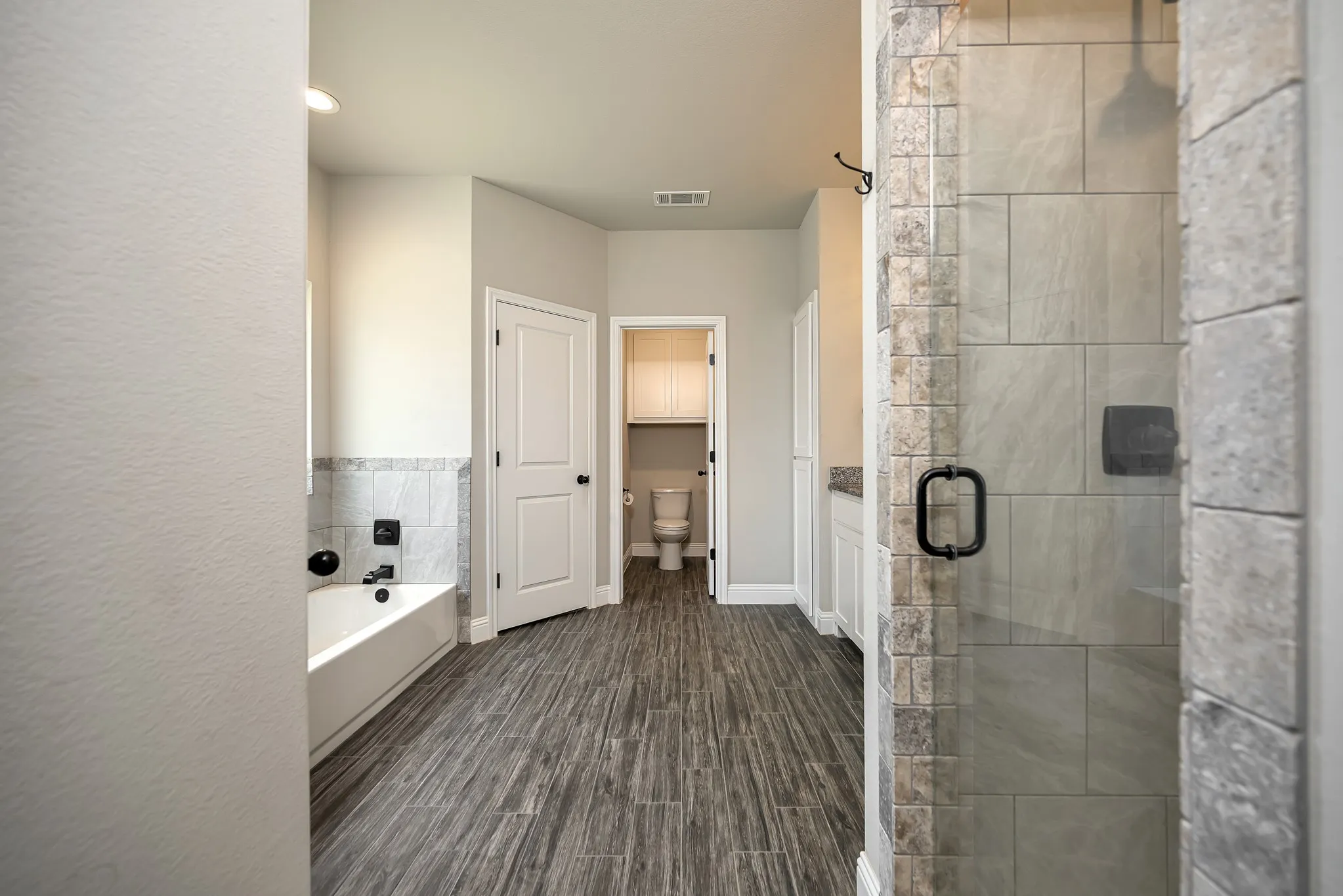 This has it all!  Shower, bath, double sink vanity, linen closet and huge walk-in closet.