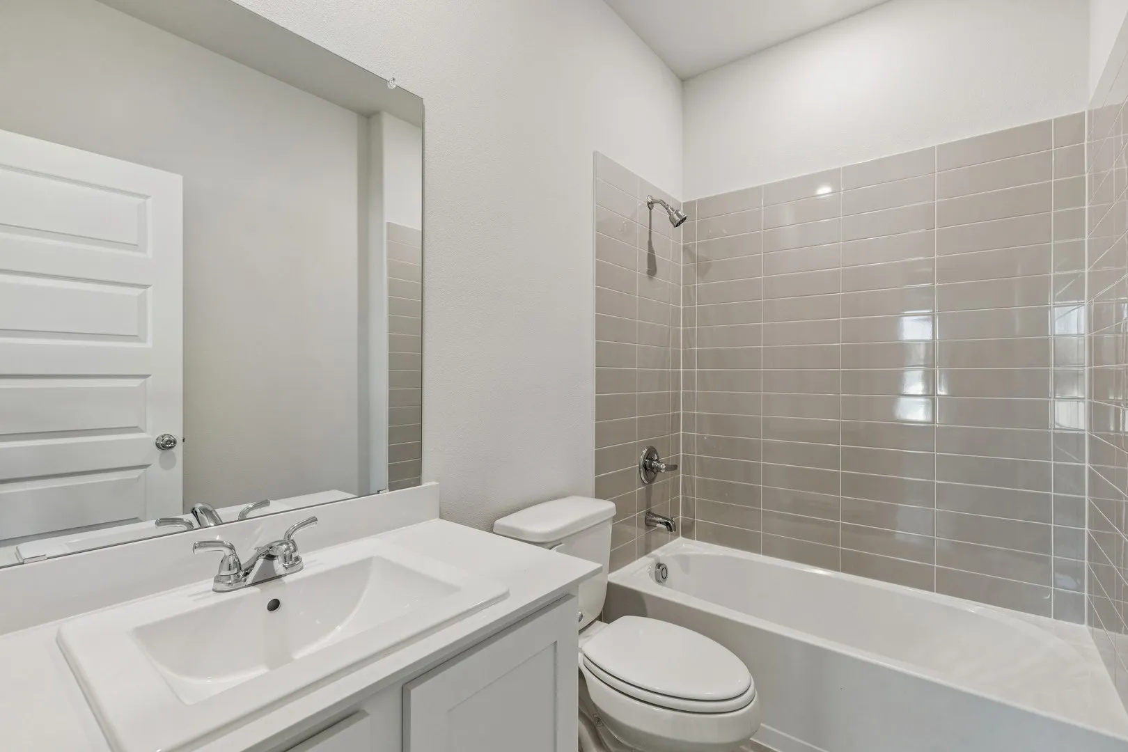 Bathroom in the Winters home plan by Trophy Signature Homes – REPRESENTATIVE PHOTO