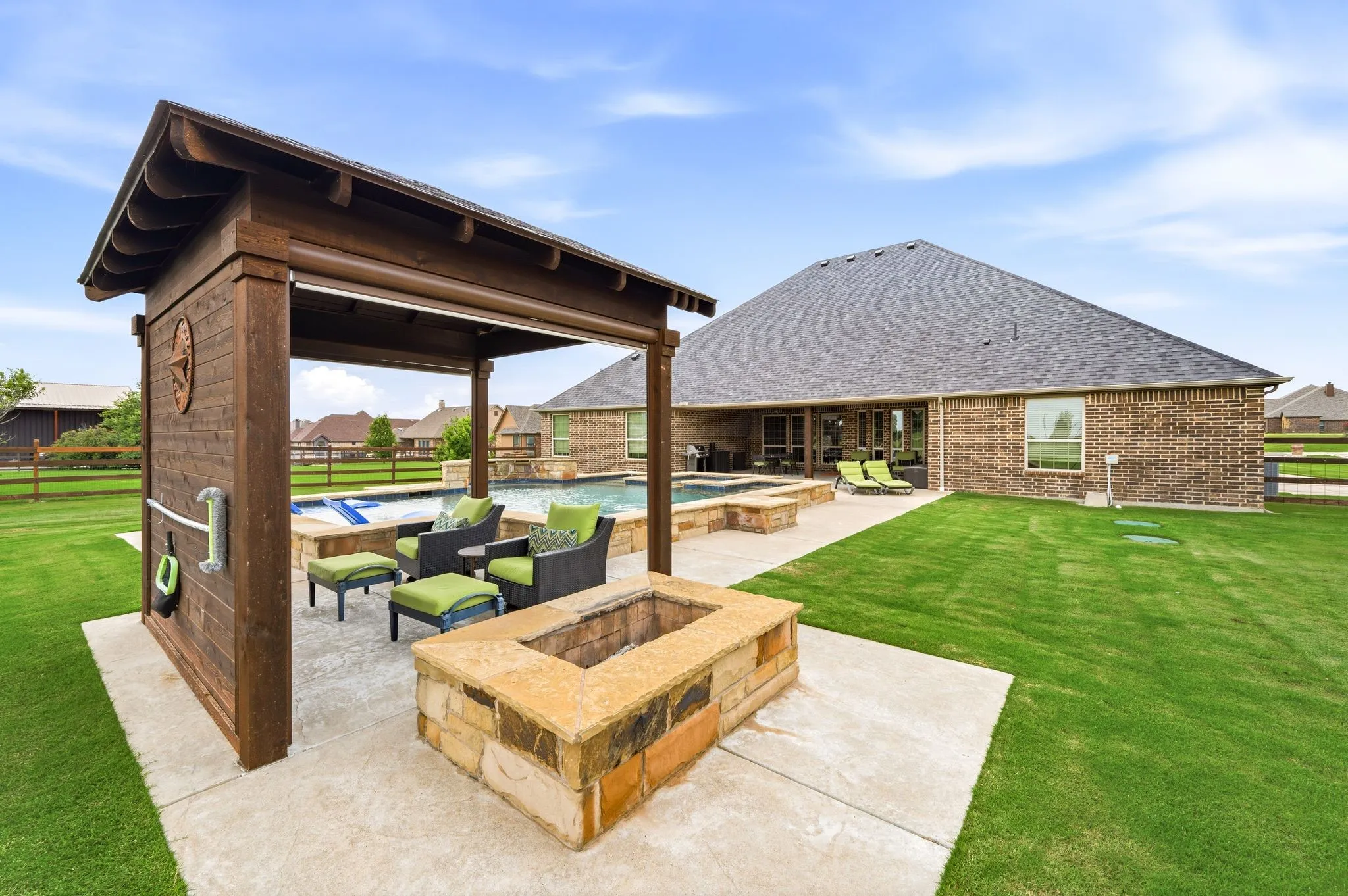 Fire pit next to pergola