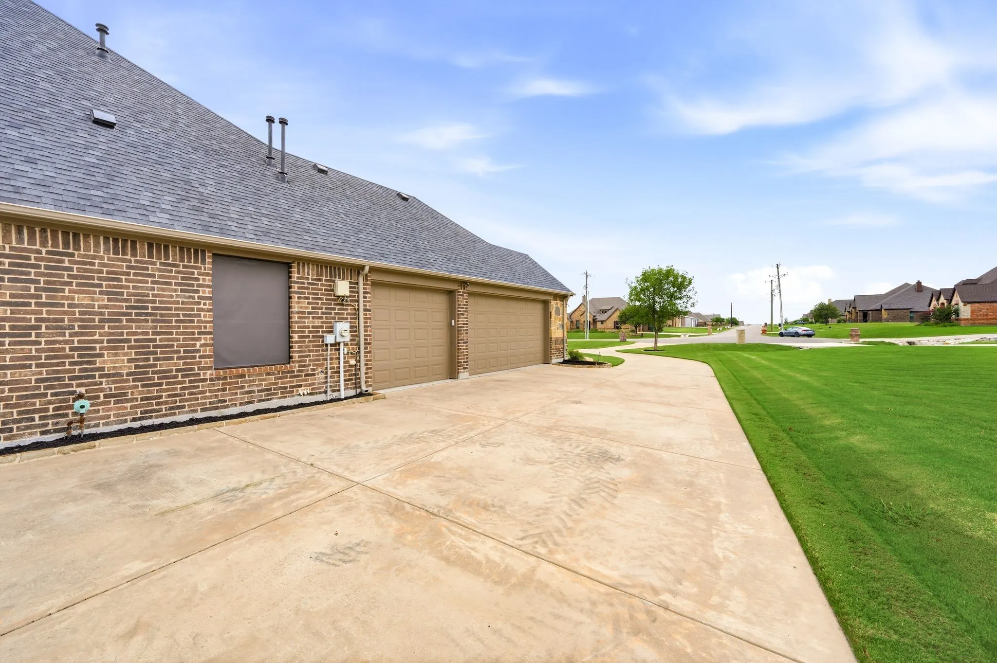 3 car garage with extended driveway