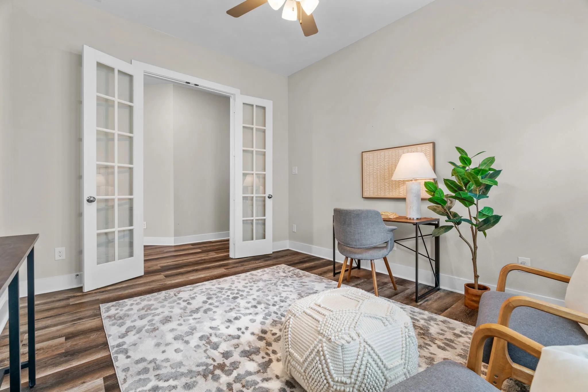 Interior space featuring wood-finish flooring and light-toned walls