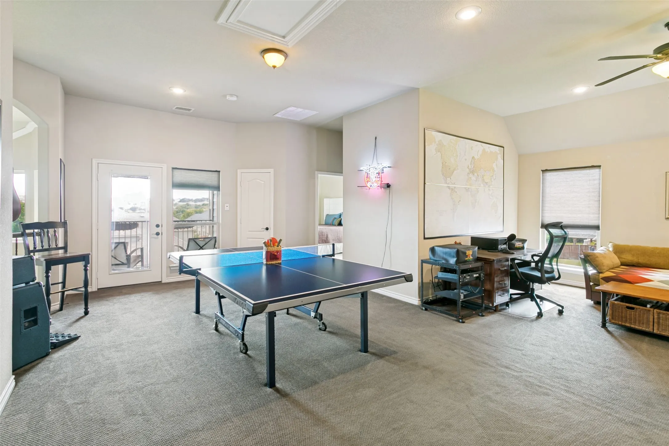 Game Room - Fun time recreational room featuring recessed ceiling lighting, and expansive windows with natural light
