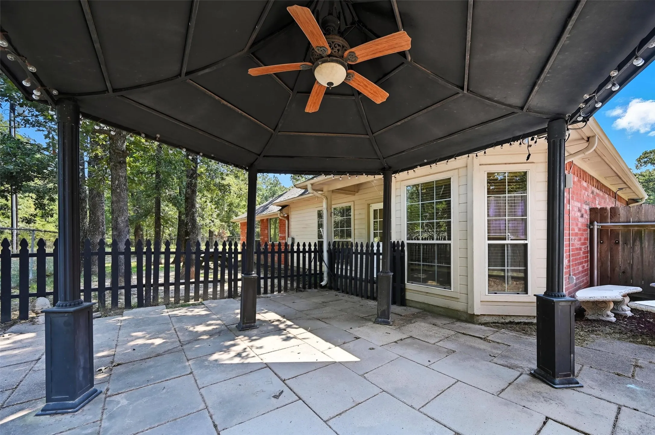 View of patio / terrace with a ceiling fan