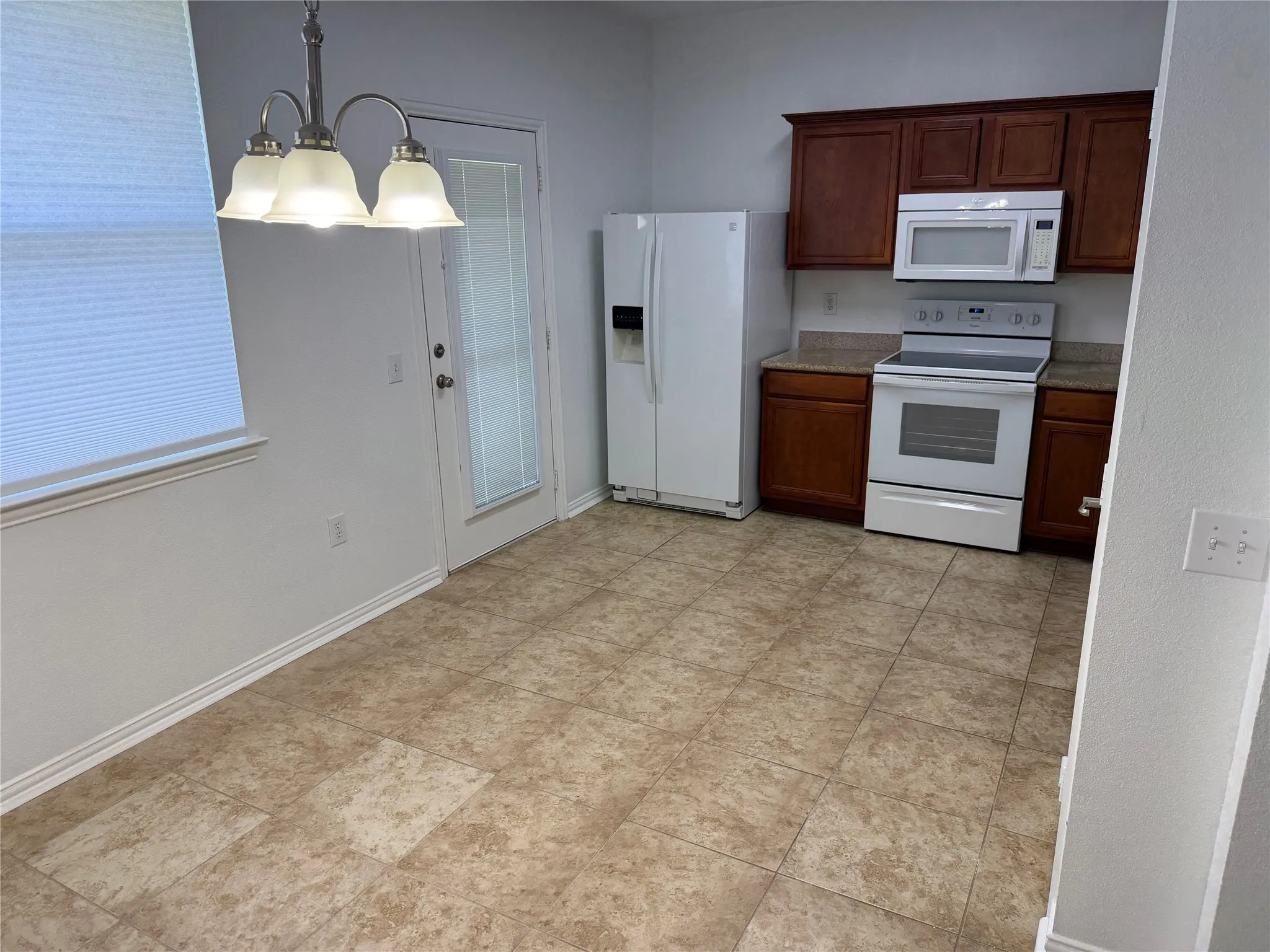 View from the side of the eat in area in the kitchen.