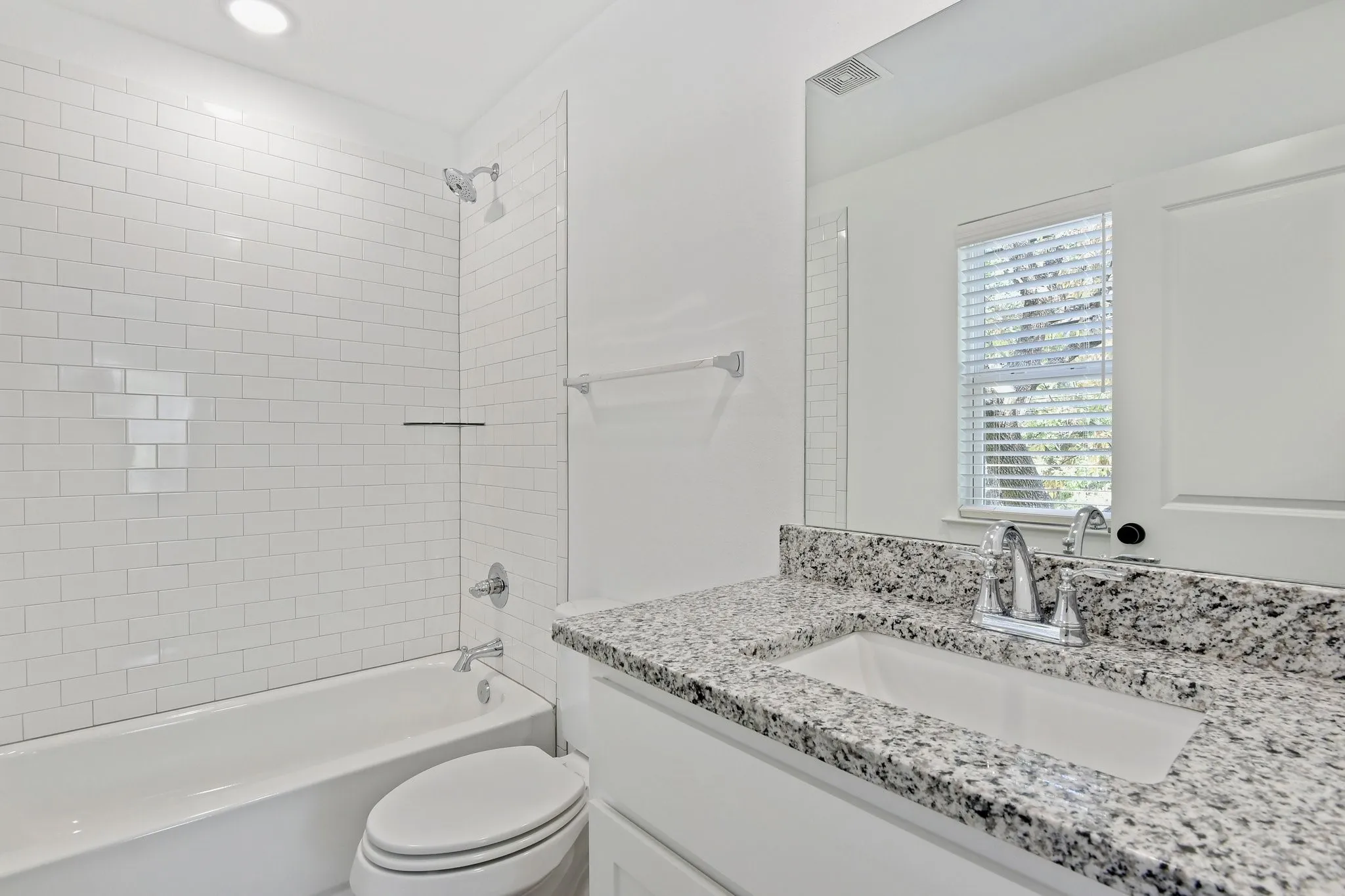 Full bathroom featuring tub / shower combination and vanity