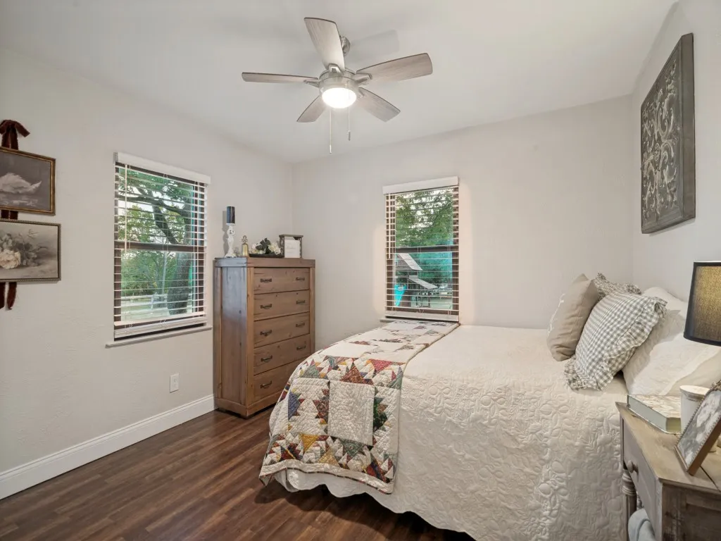 Whether it's your guest room or a kids room, this bedroom has fantastic views out the windows.