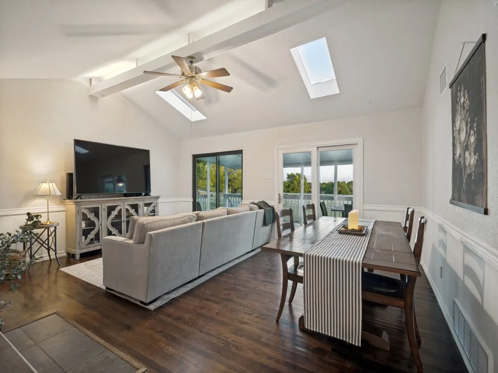 Design features like chair rail, vaulted ceilings and lots of natural light make every space in this country home inviting.