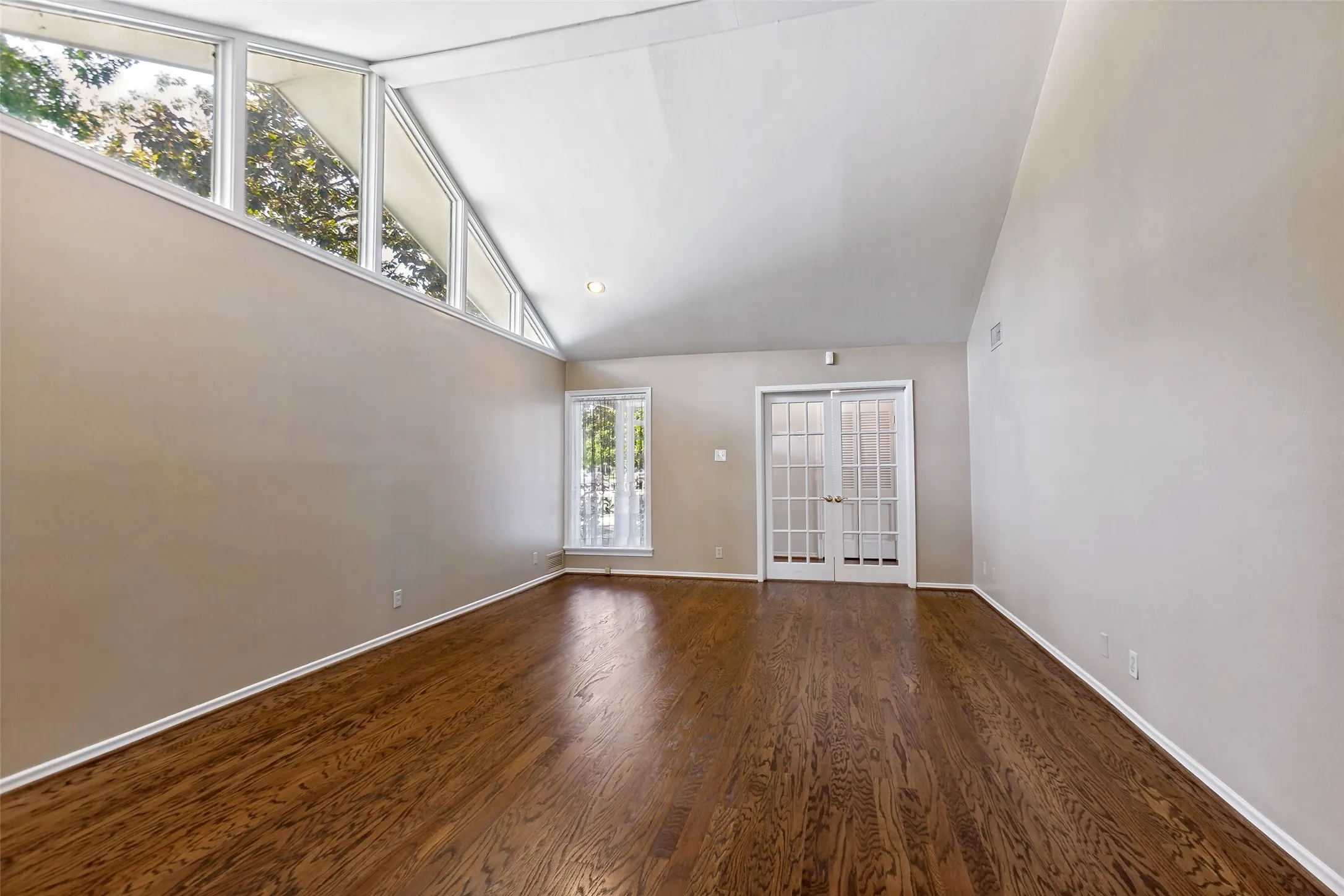 Light filled with extended wall space.
