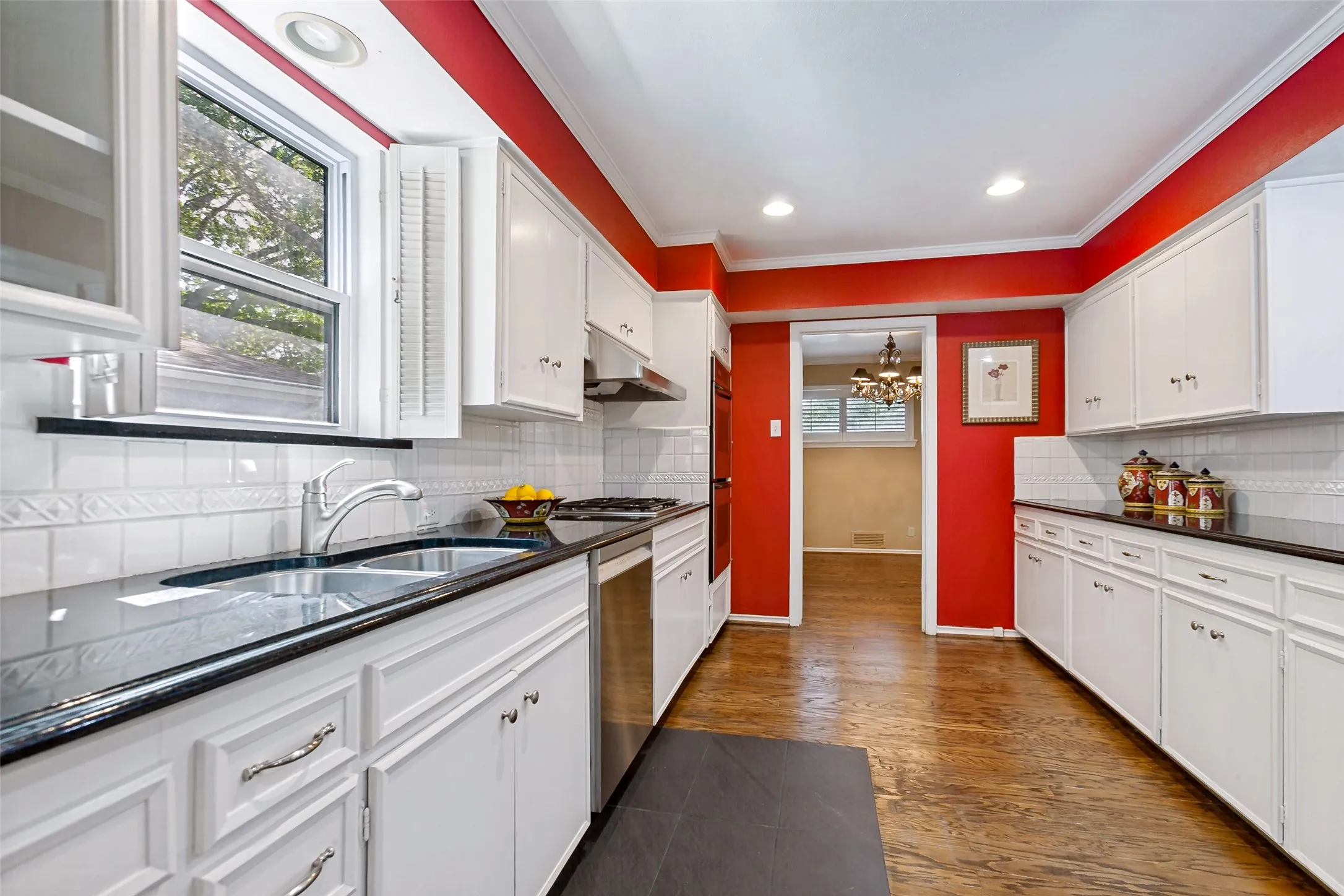 Expansive counters and cabinets. Leading to the formal dining.