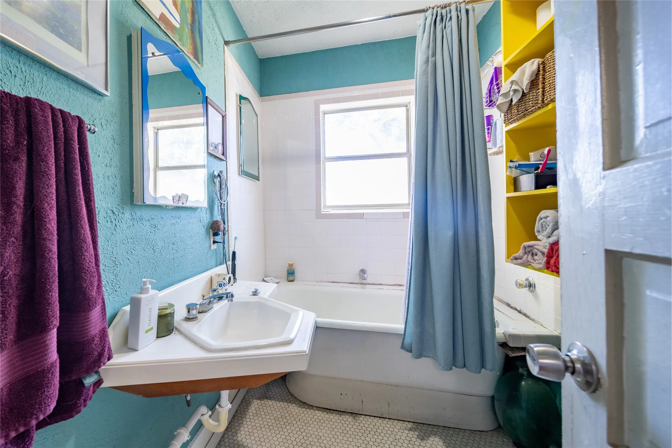 909 1/2 Sunset - The bathroom is located at the back of the home.