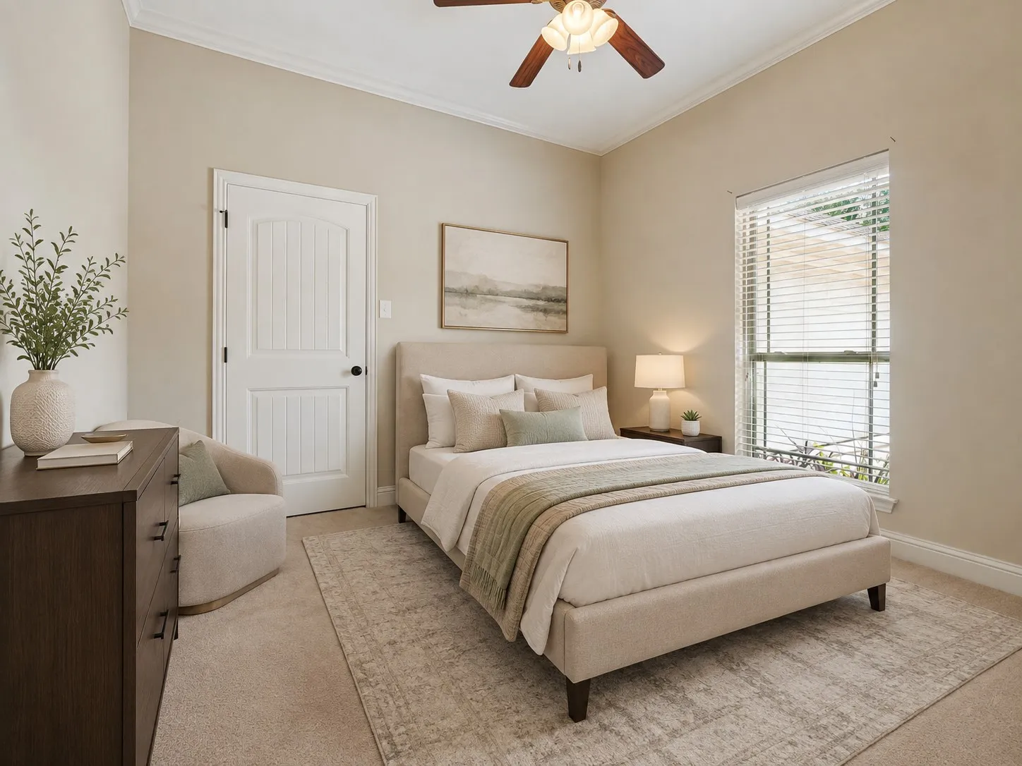 Carpeted room with a ceiling fan, crown molding, and a window featuring horizontal blinds