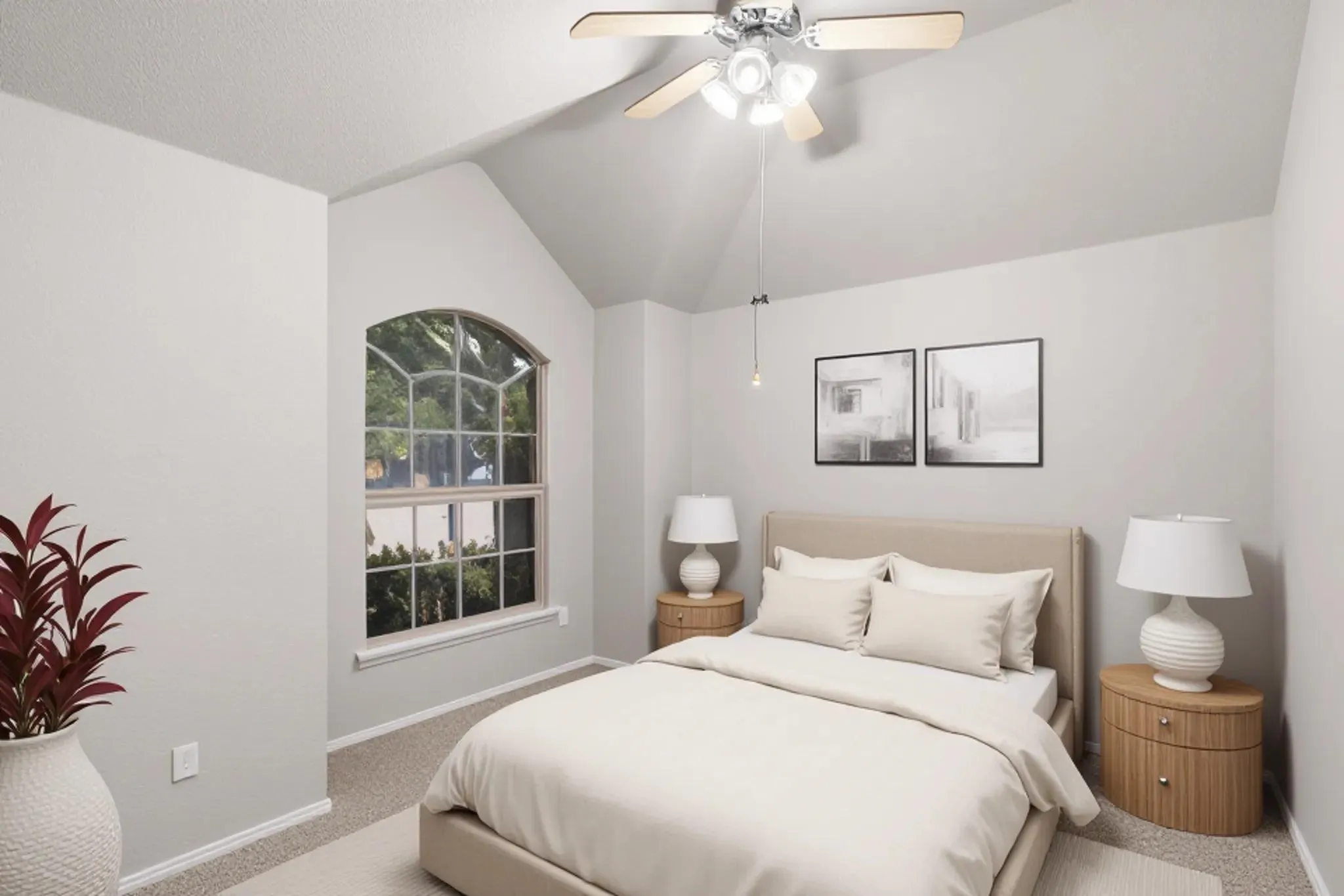 Vaulted ceiling room featuring an arched window, textured carpeting, a ceiling fan with integrated lighting, and neutral wall​​‌​​​​‌​​‌‌​‌‌​​​‌‌​‌​‌​‌​​​‌​​ tones