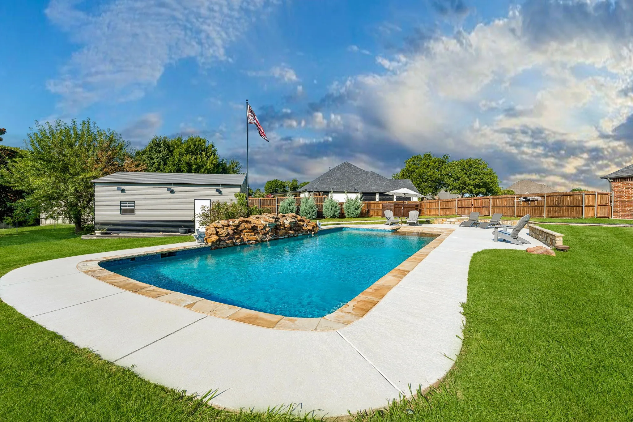 Pool with workshop in the back ground.