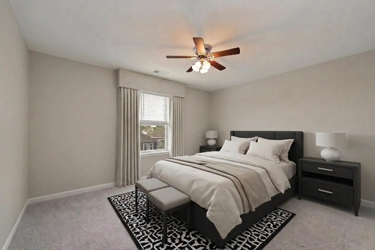 Large bedroom located on the second level with a walk in closet