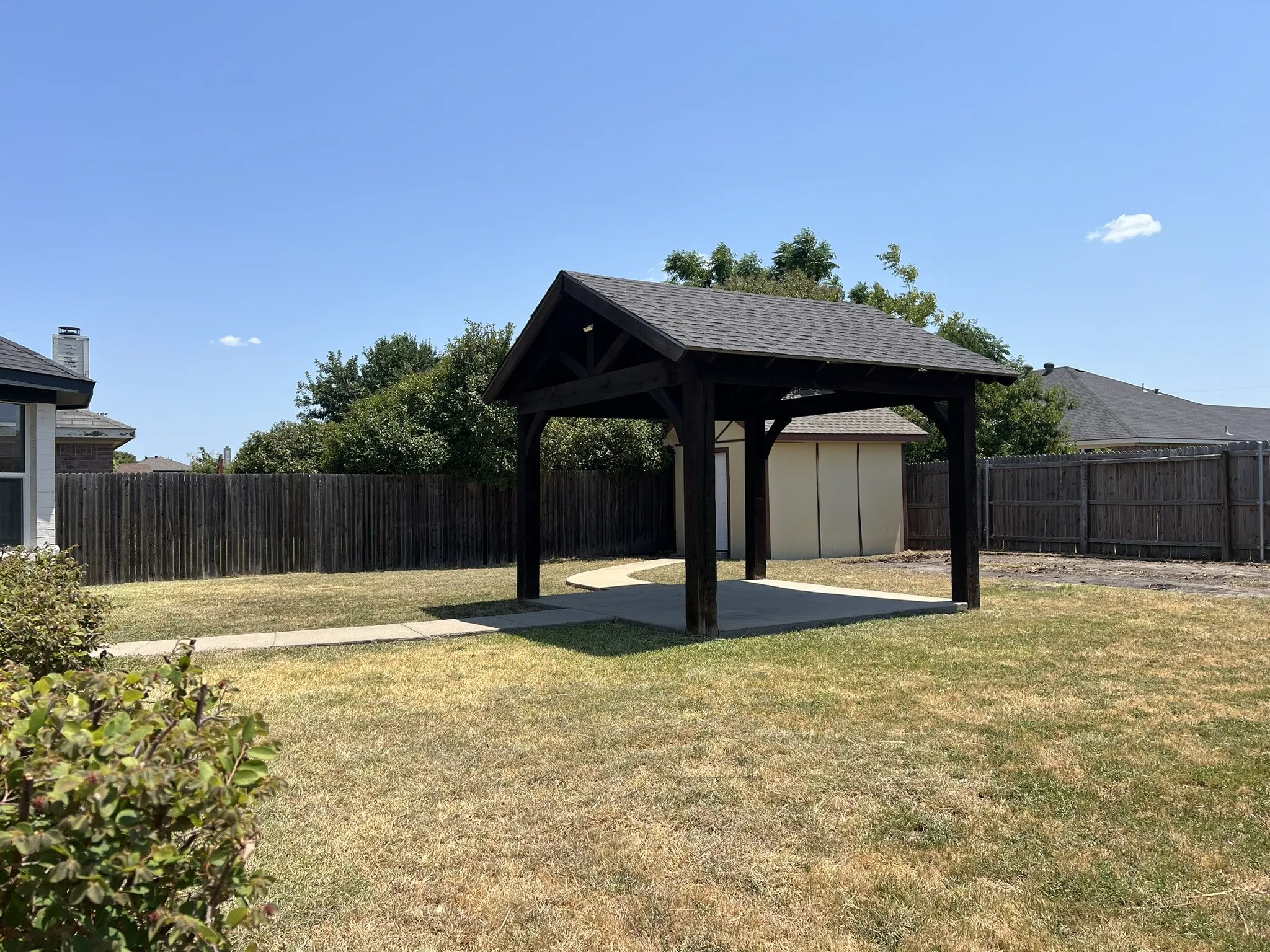 Backyard featuring a gazebo