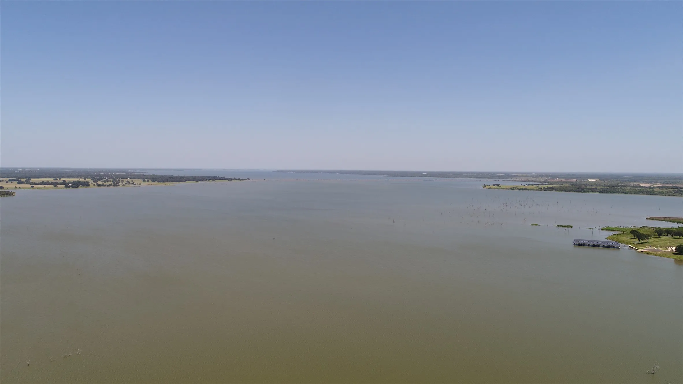 Expansive body of water with a clear horizon