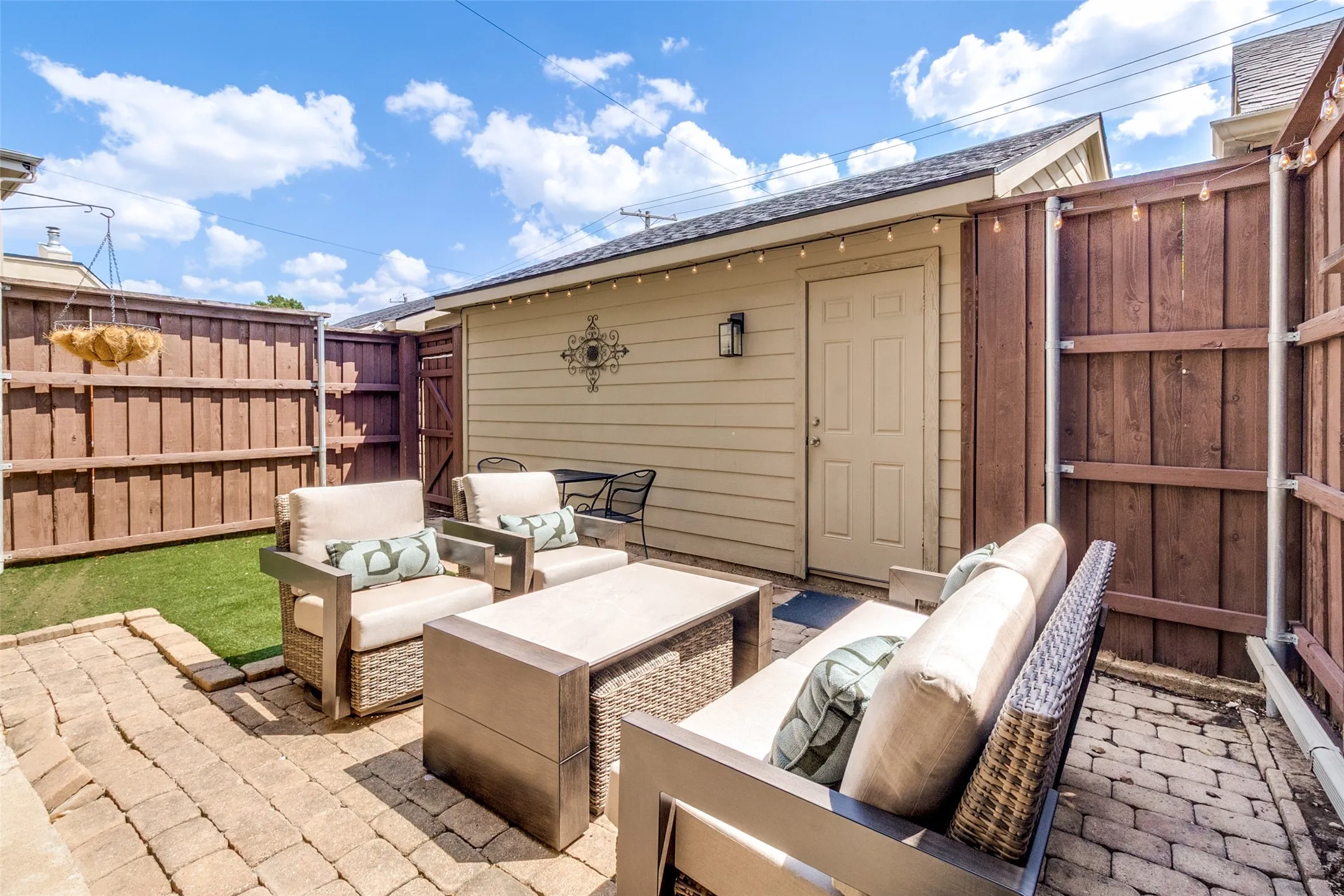fence yard and patio with access to 2 car garage
