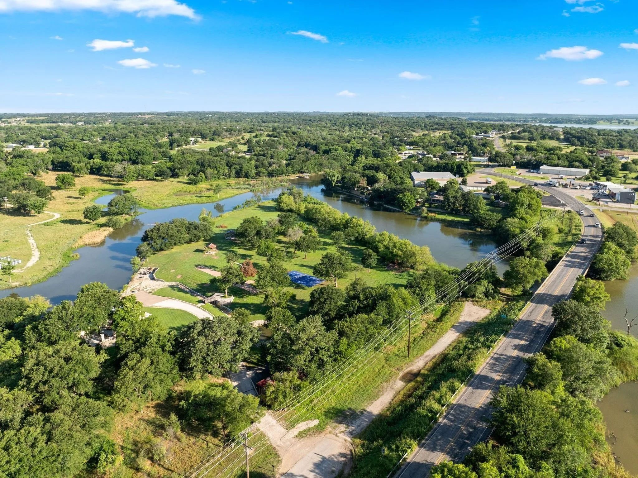 View of natural pond and community amenities