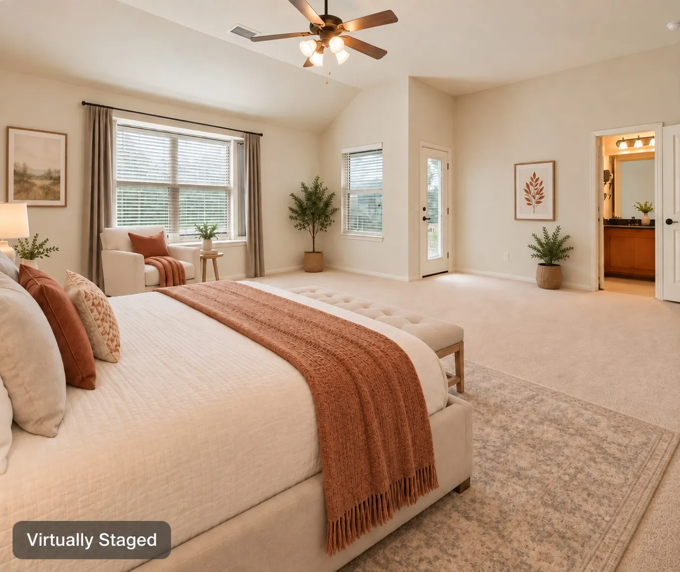 Vaulted ceiling with a ceiling fan, carpeted flooring, large window with blinds, and a glass-paneled door