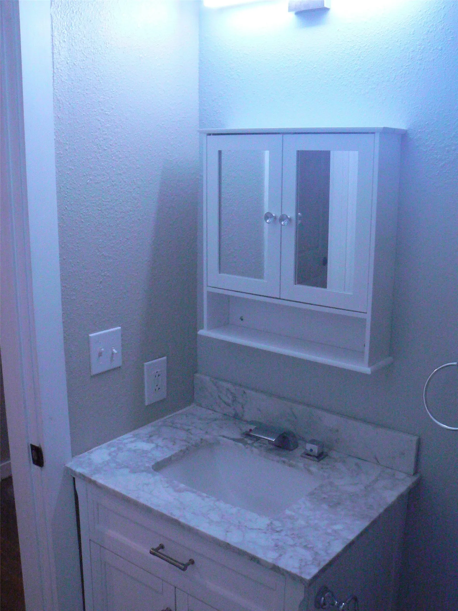 Bathroom vanity and cabinet.