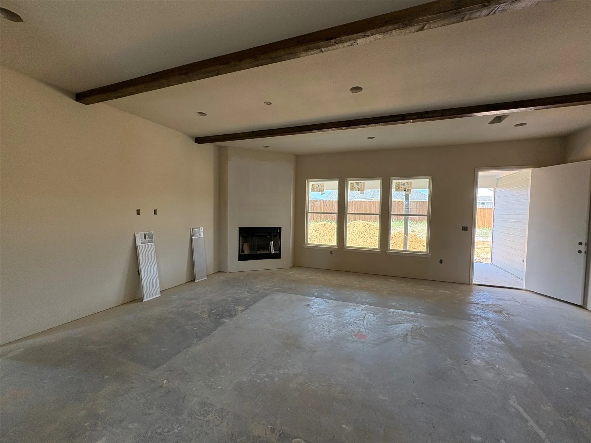 Fireplace will have rock and stone mantel