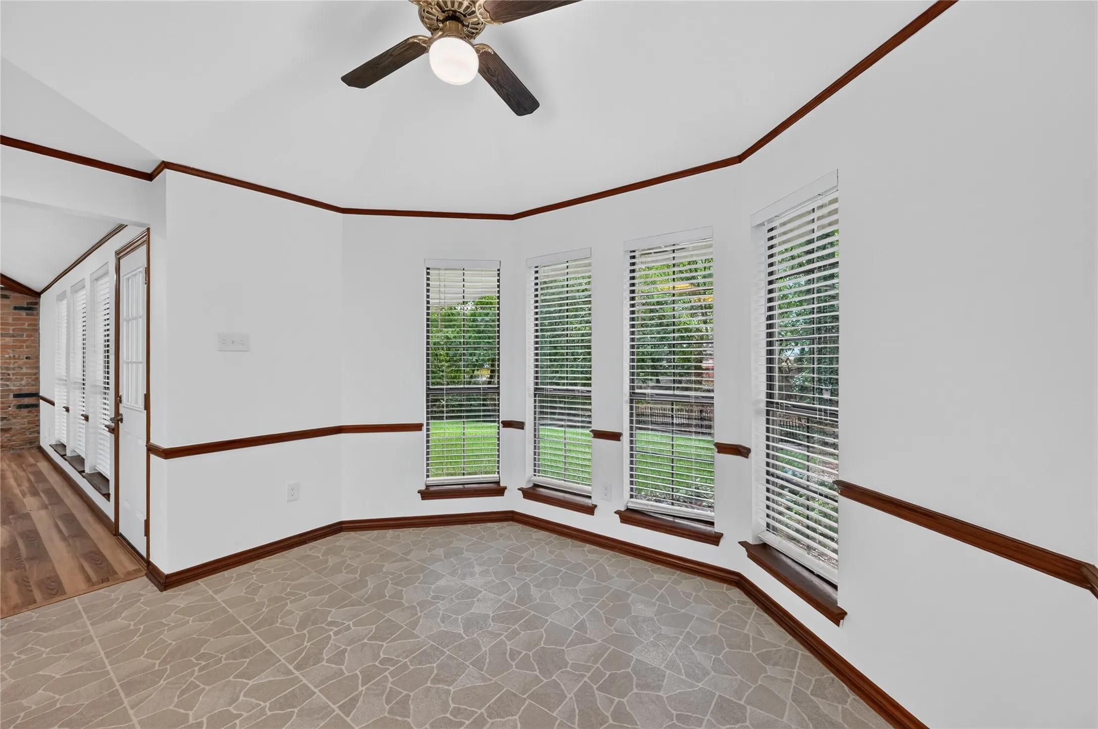 Bay window with multiple panes, providing natural illumination
