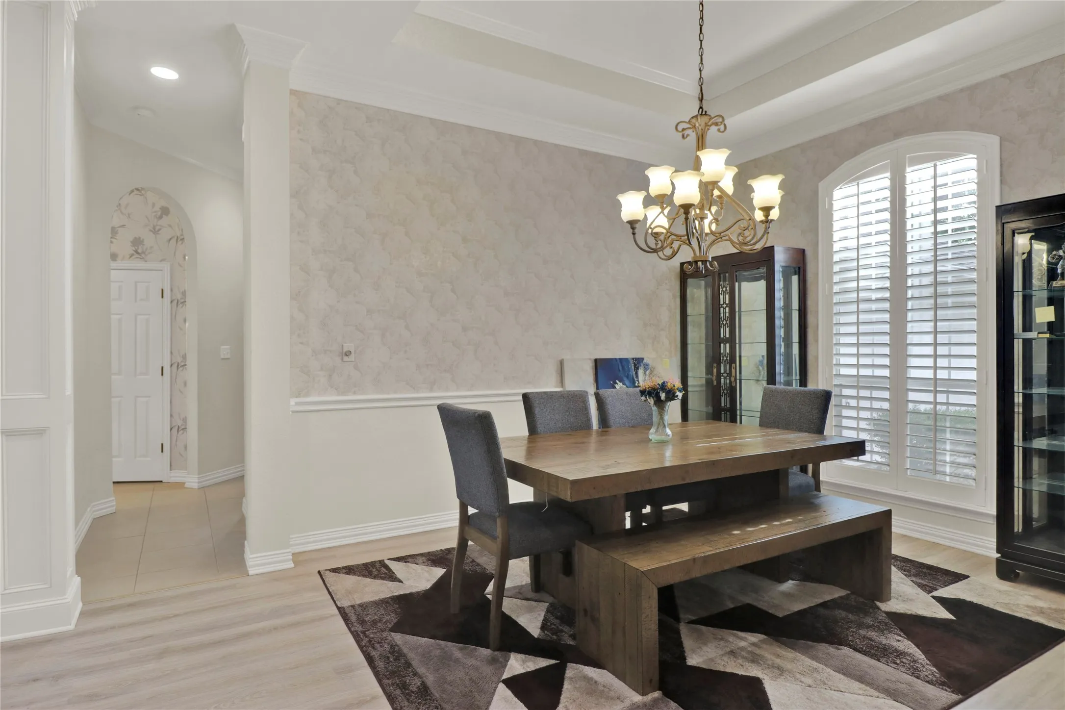 Formal dining space with perfect lighting.