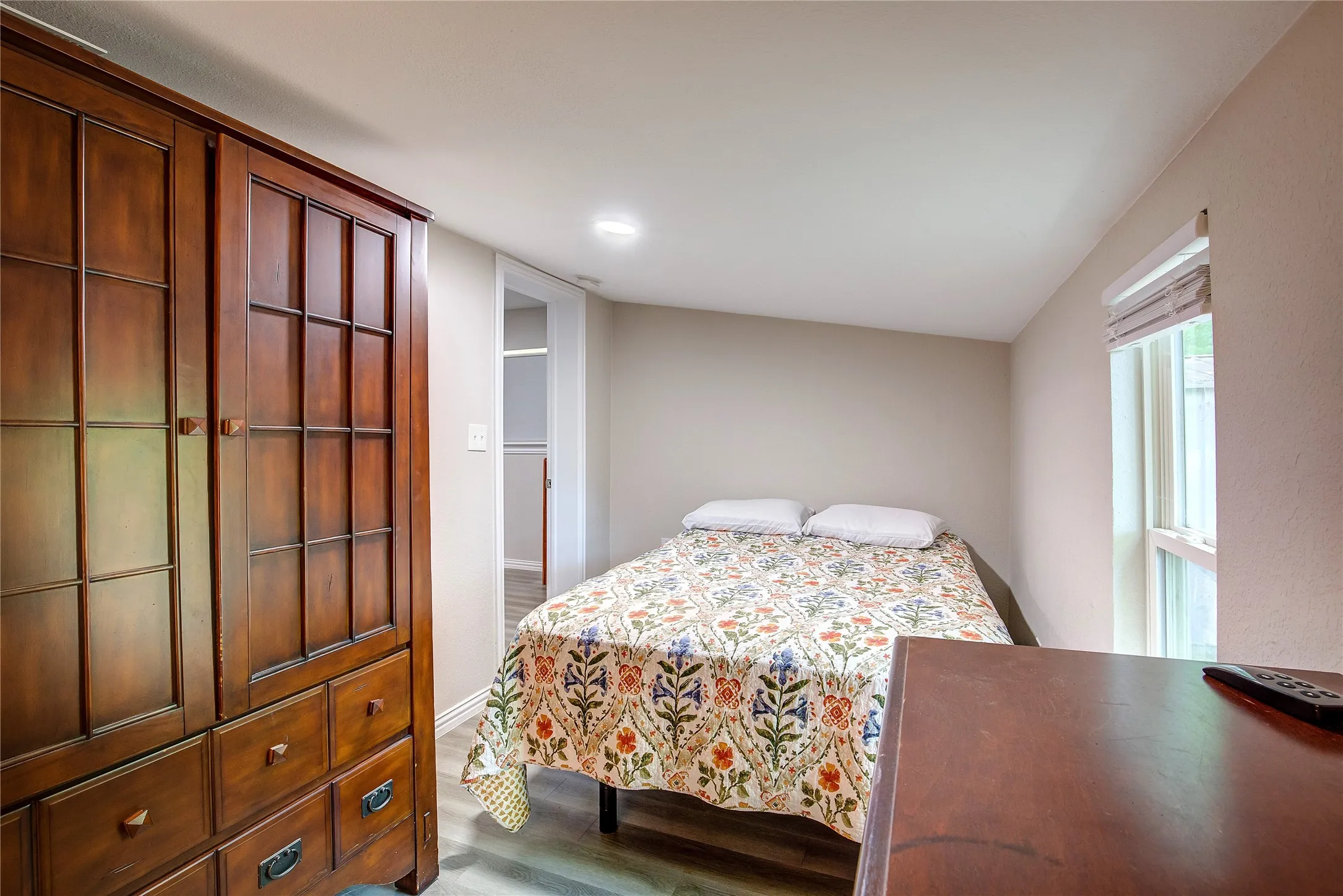 Bedroom featuring wood finished floors