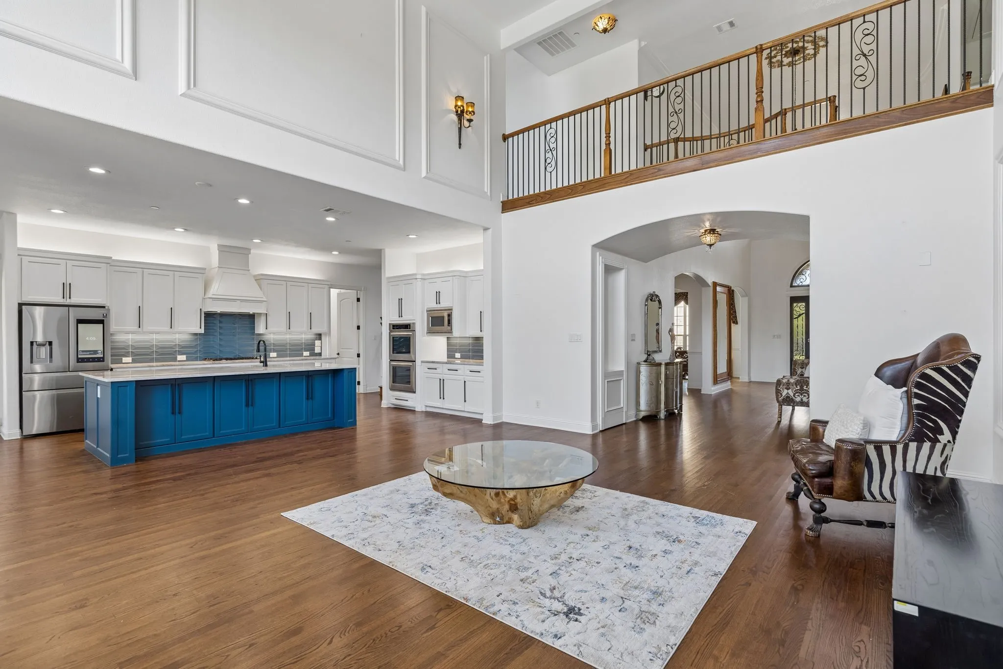 Light. Bright. Soaring ceilings...this open concept is a dream floor plan.