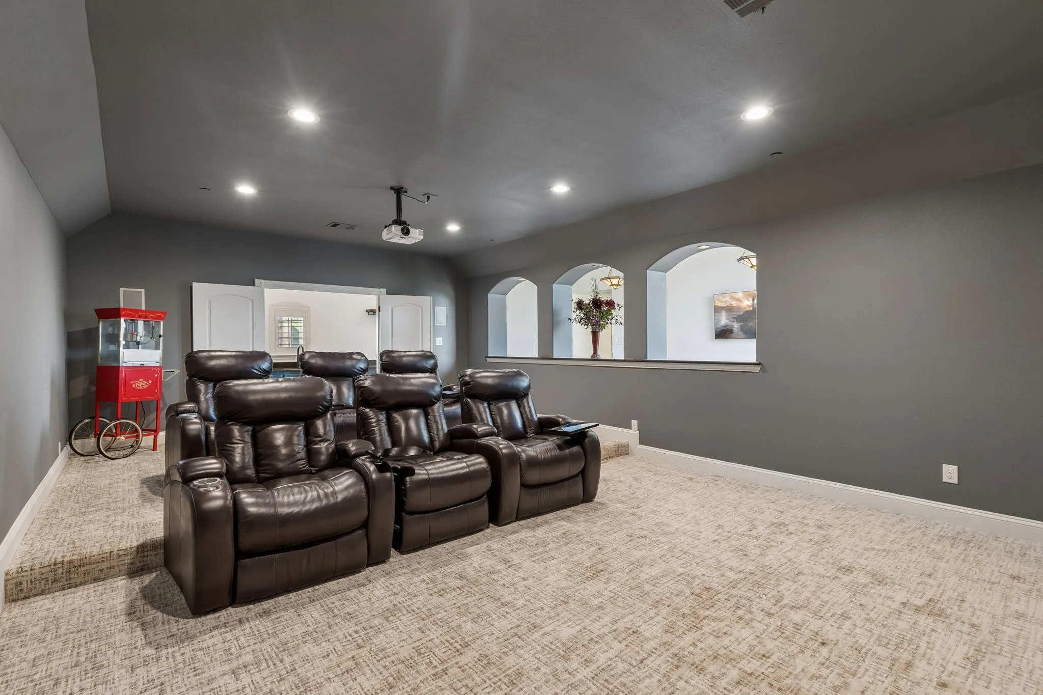 Another view of the media room showing the elevated floor for ideal viewing