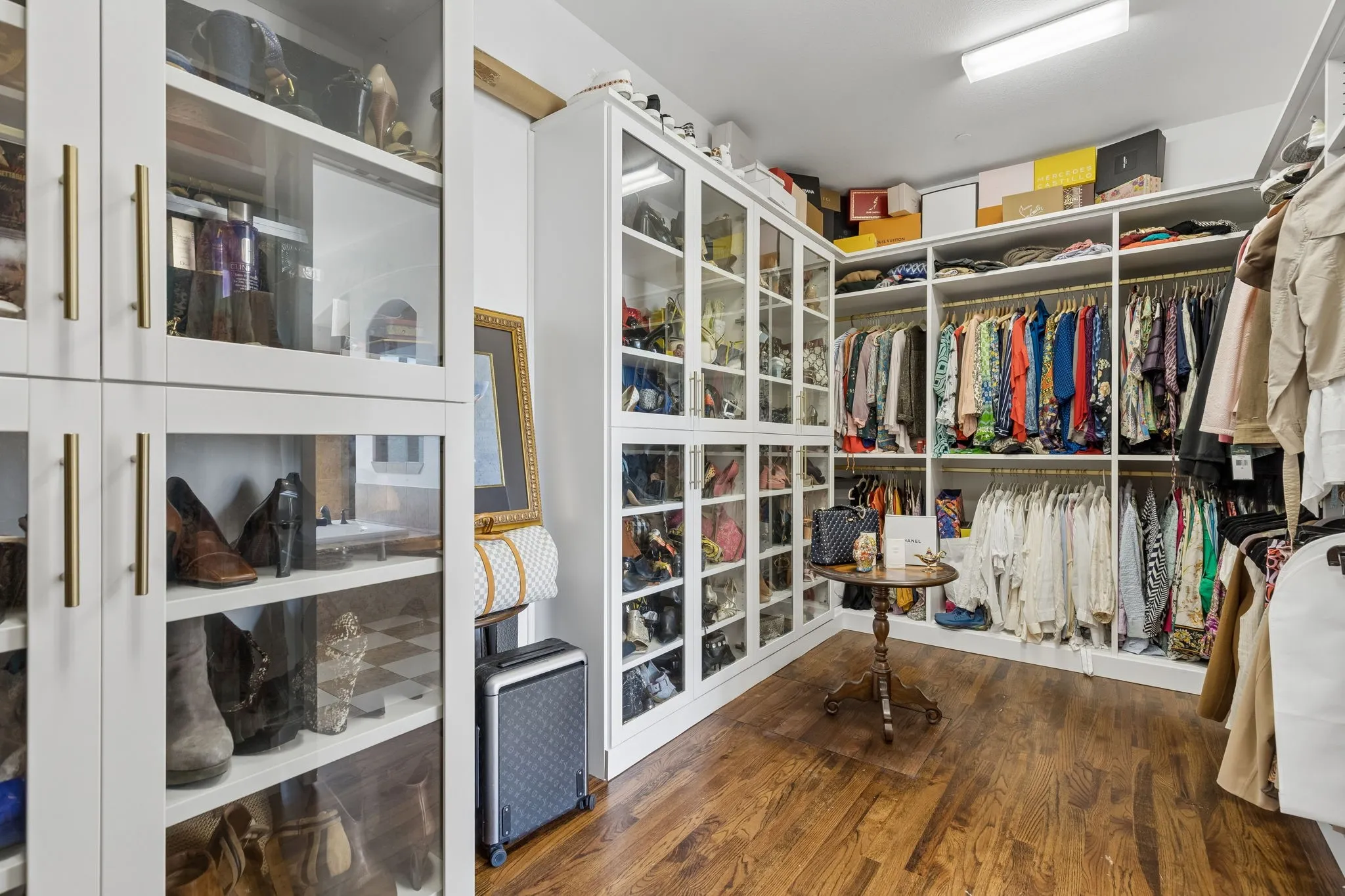 Her closet is a California closet system that is massive. Full closet is not pictured. It's even bigger!