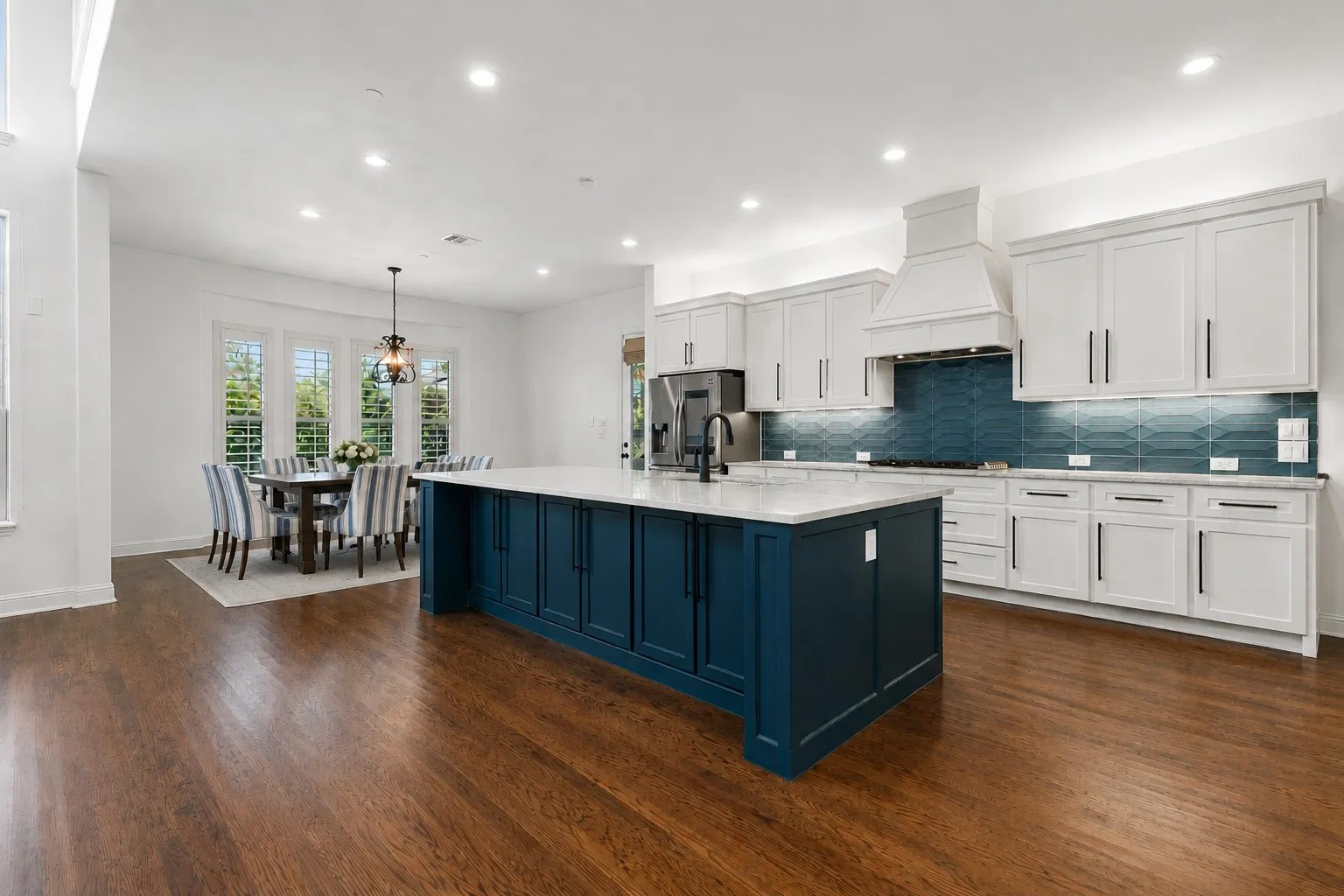 This navy blue has to be seen in person. It is stunning! It anchors the home's in calm and quiet sophistication. Partial virtual staging