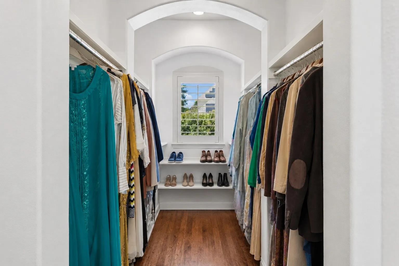 His closet. Primary.