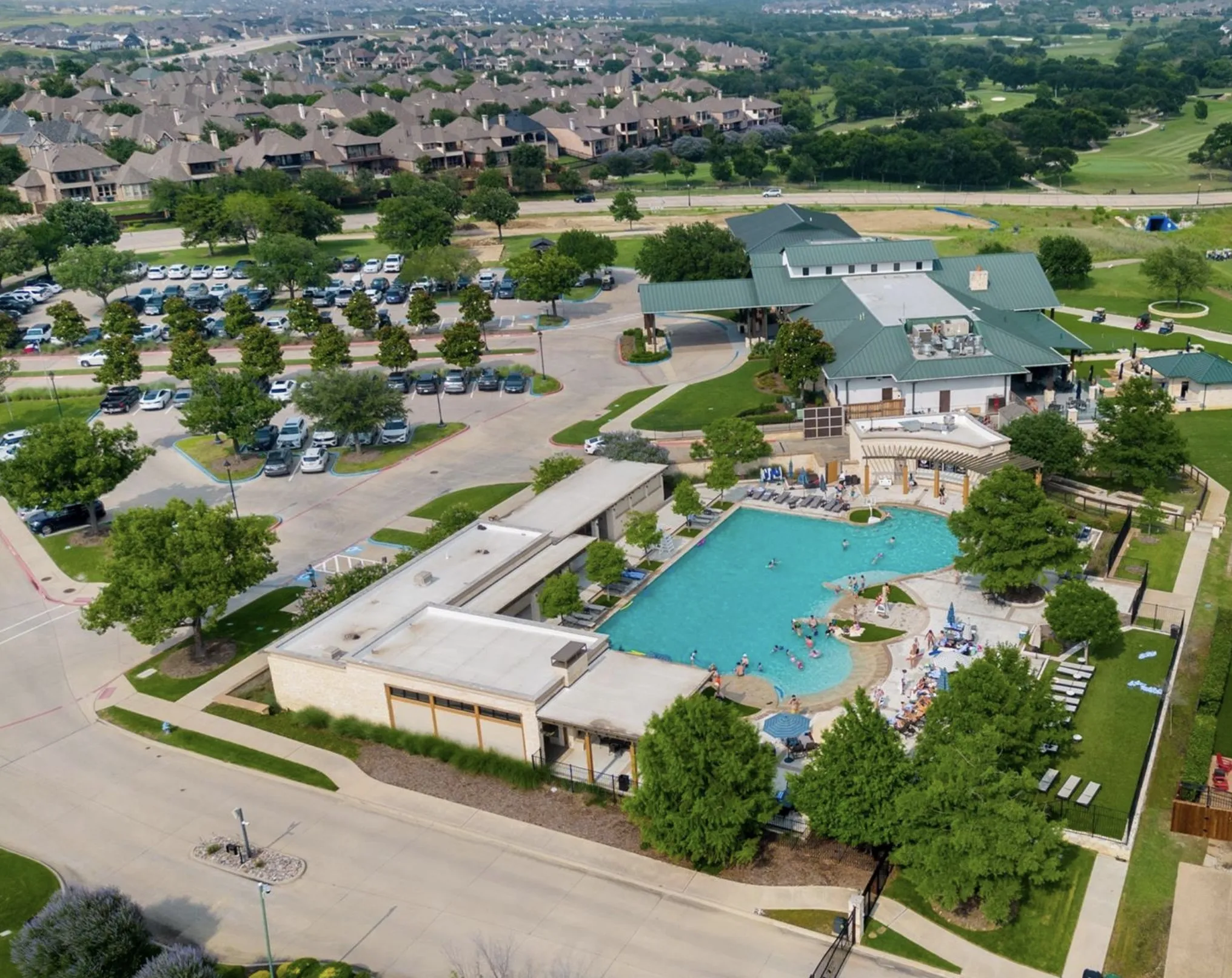 The beautiful Lakes Country Club pool and clubhouse