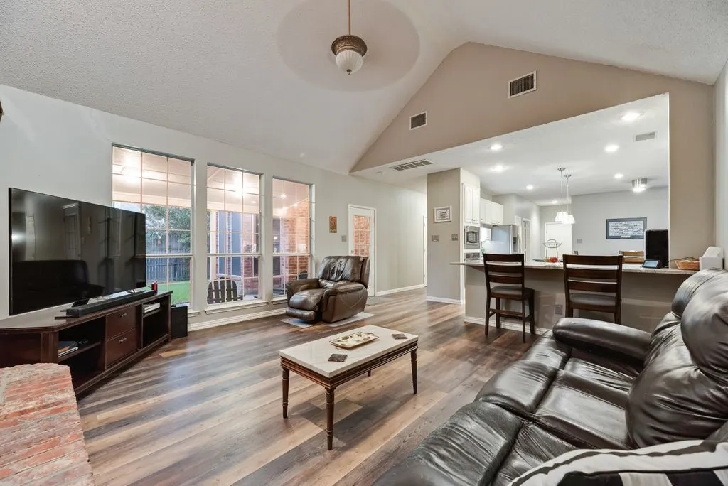 Open from kitchen and entry to backyard patio